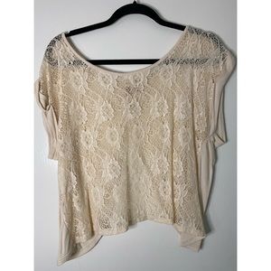 Cut through pattern top with open back